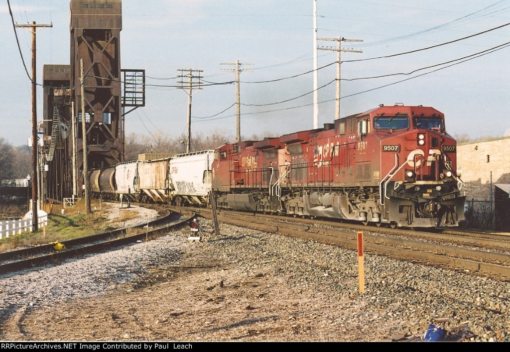 Eastbound grain train comes off the bridge